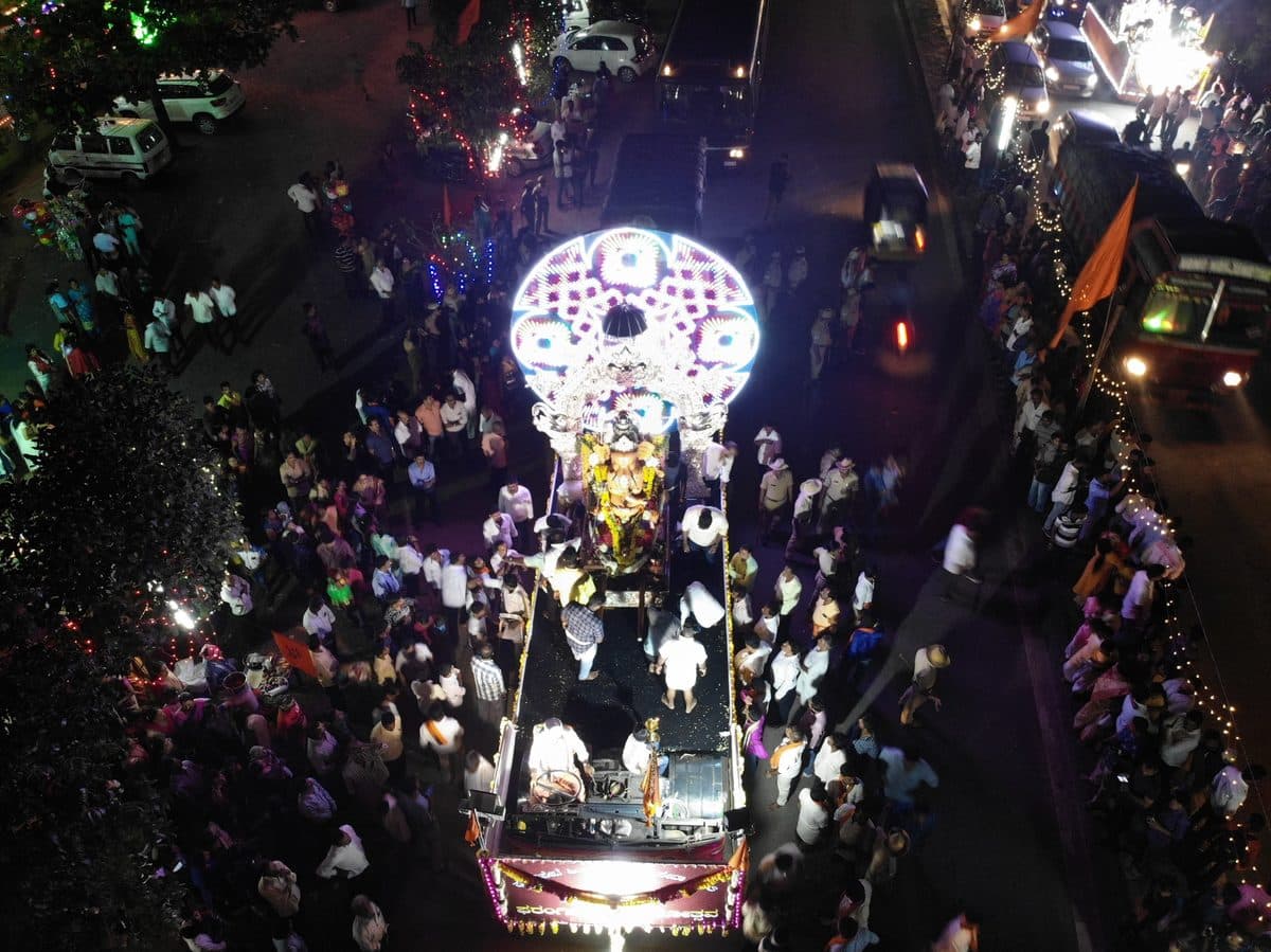 Ganesh procession with lights — aerial